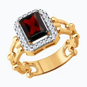 Кольцо из золочёного серебра с гранатом и фианитами