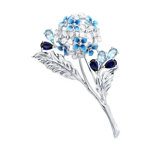 Брошь из серебра с миксом камней