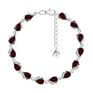 Браслет из серебра с гранатами и фианитами
