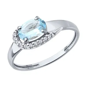 Кольцо из серебра с топазом и фианитами