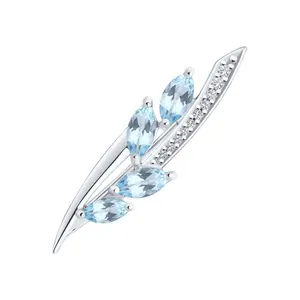 Брошь из серебра с топазами и фианитами