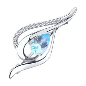 Брошь из серебра с топазом и фианитами