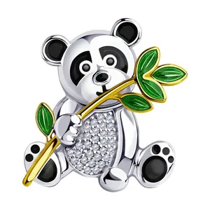 Брошь из золочёного серебра с эмалью и фианитами