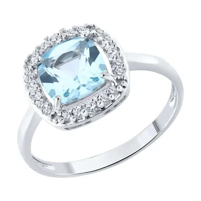 Кольцо из серебра с топазом и фианитами из серебро