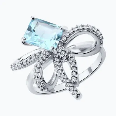 Кольцо из серебра с топазом и фианитами из родированное серебро