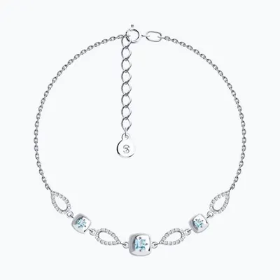 Браслет из серебра с голубыми топазами и фианитами из серебро